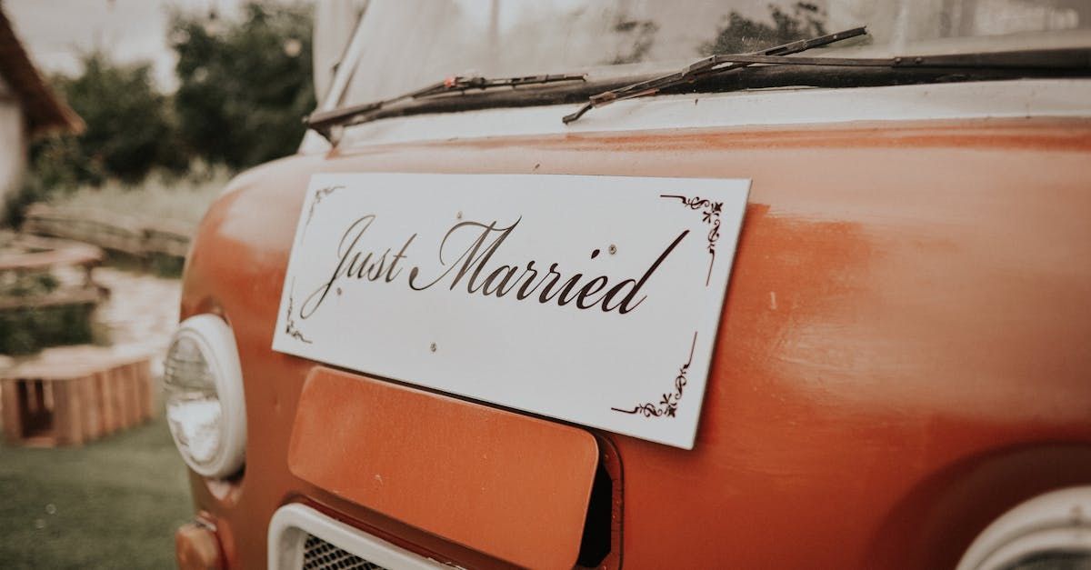 A car with a just married sign on it.