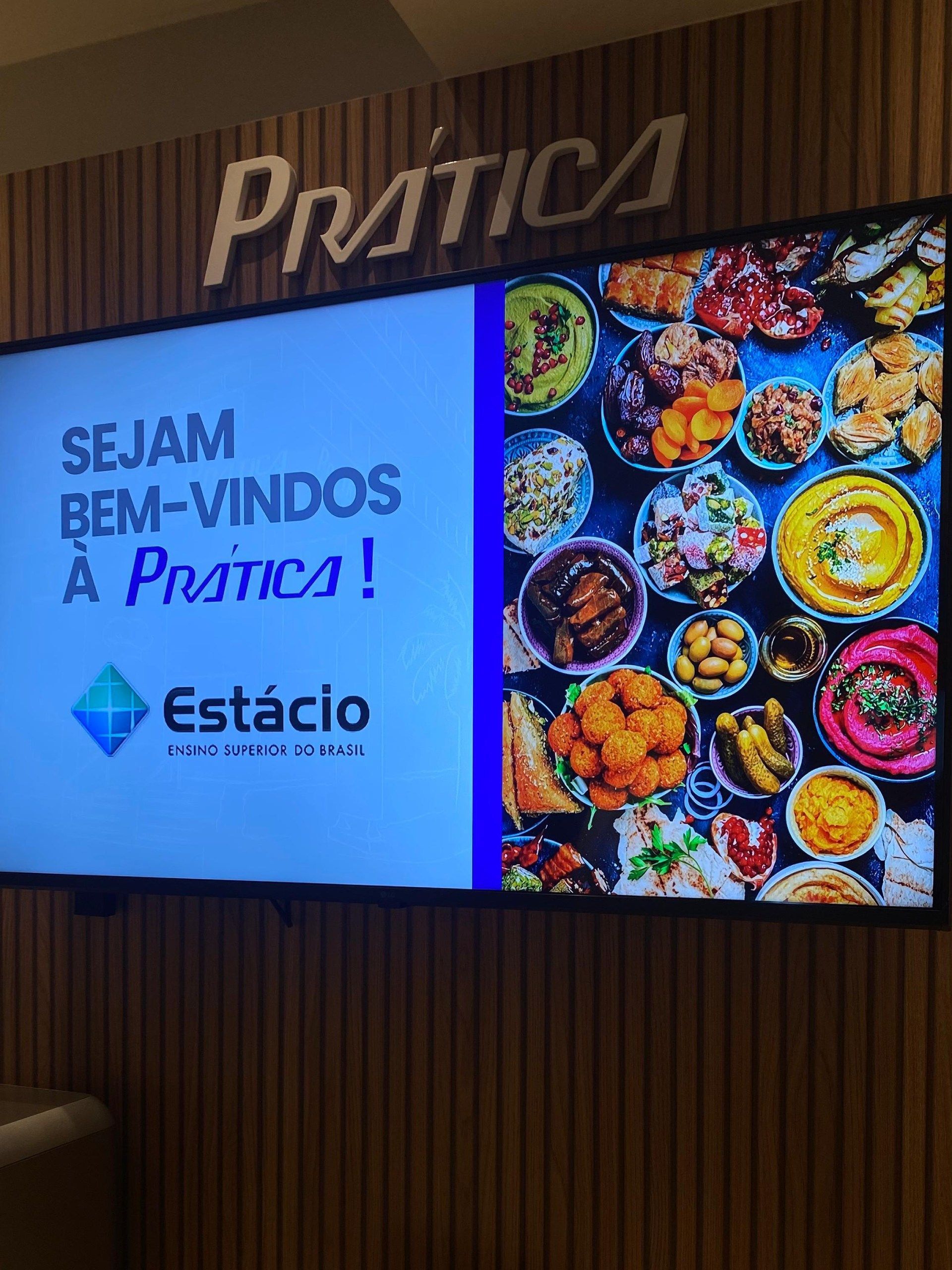 A sign on a wall that says