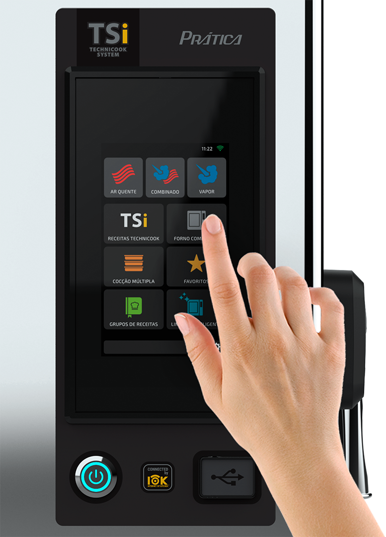 Uma mão está pressionando um botão em um dispositivo com tela sensível ao toque.