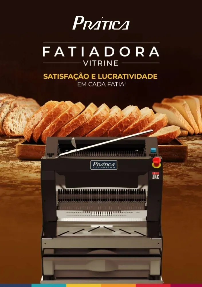 Uma máquina que corta pão em uma mesa.