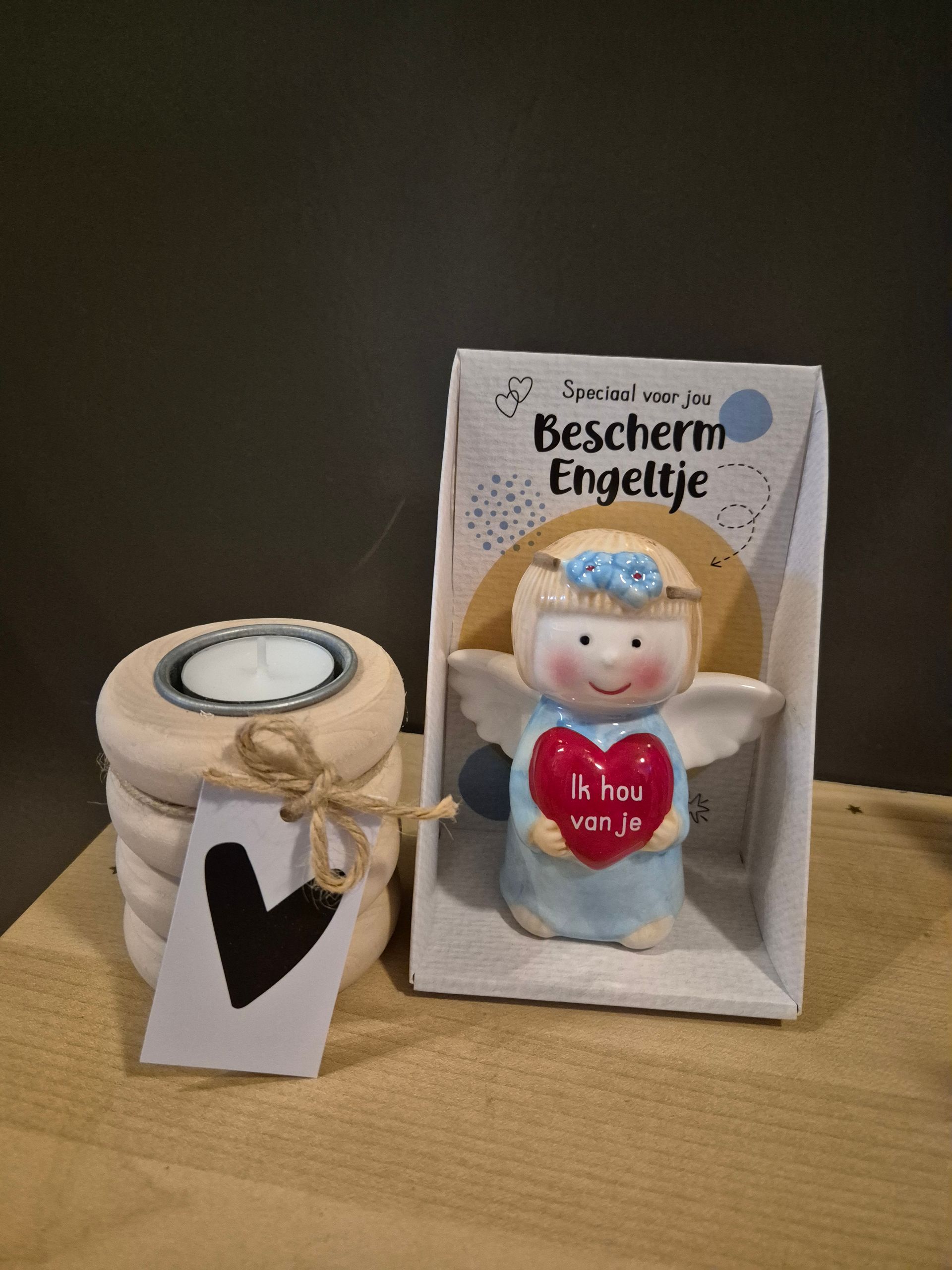 bescherm of geluks engel met kaarsje
