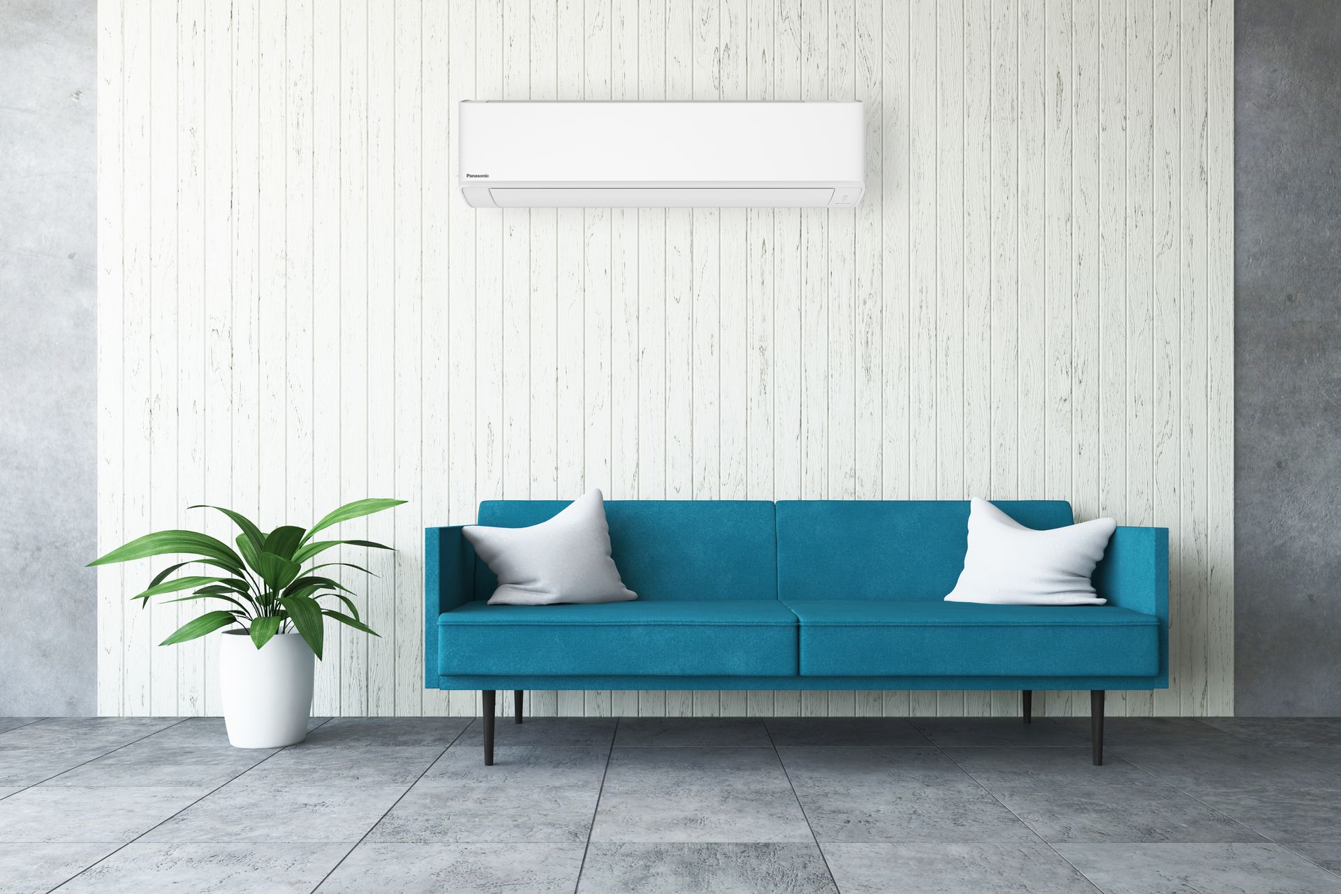 Modern white hi-wall heat pump unit on a wall
