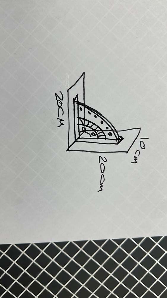 A black and white drawing of a ruler on a piece of paper.