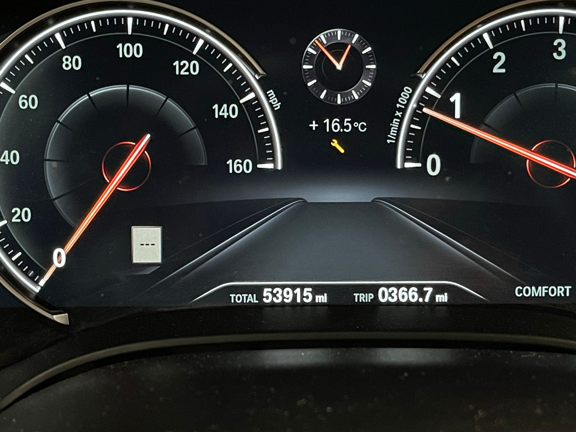 A close up of a car dashboard that says comfort