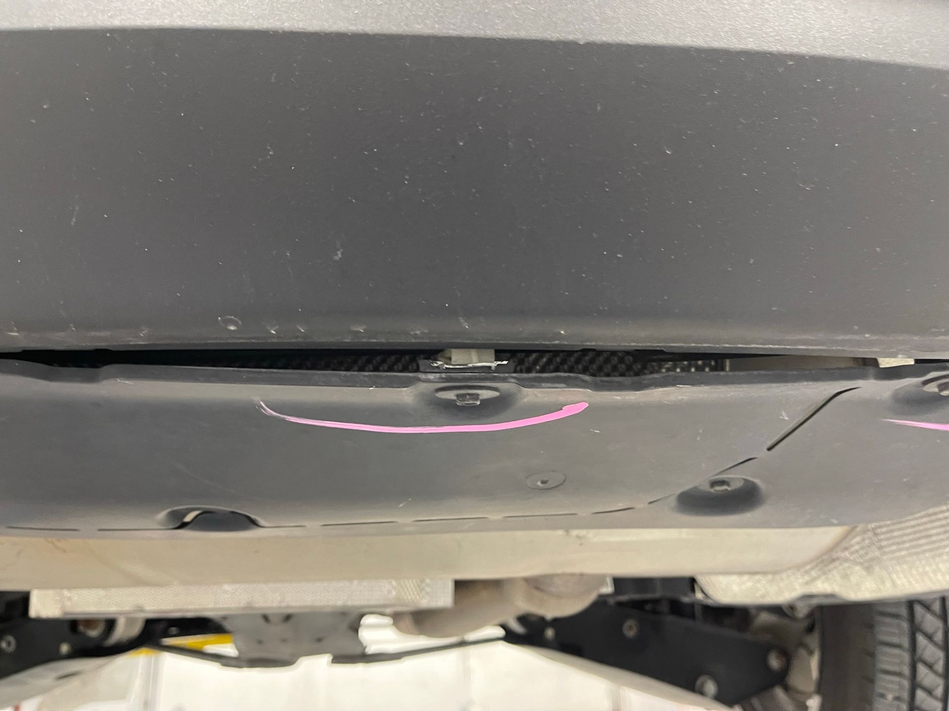 A close up of the underside of a car.