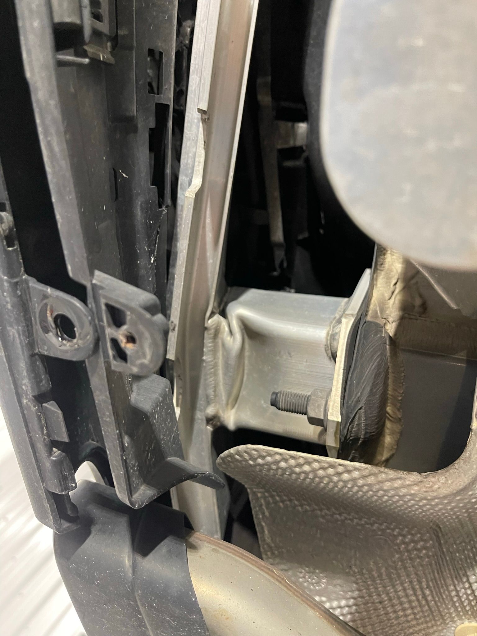 A close up of a radiator on a car.