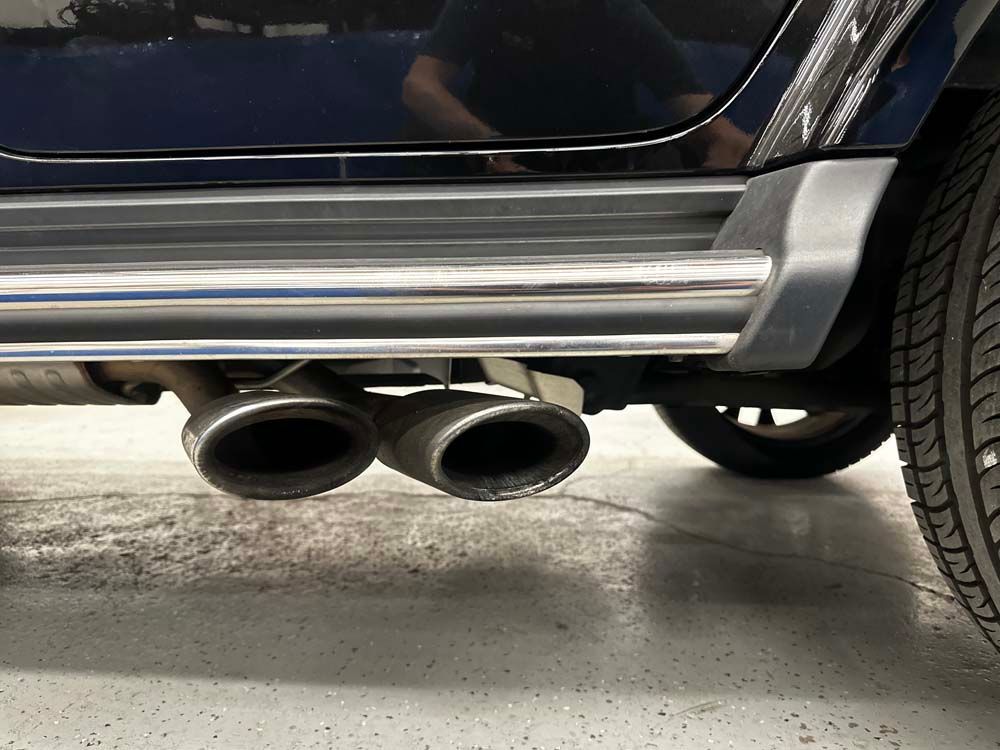 A close up of the exhaust pipes of a car