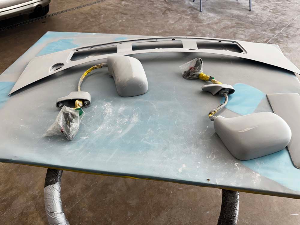 A table with a bunch of wires laying on it