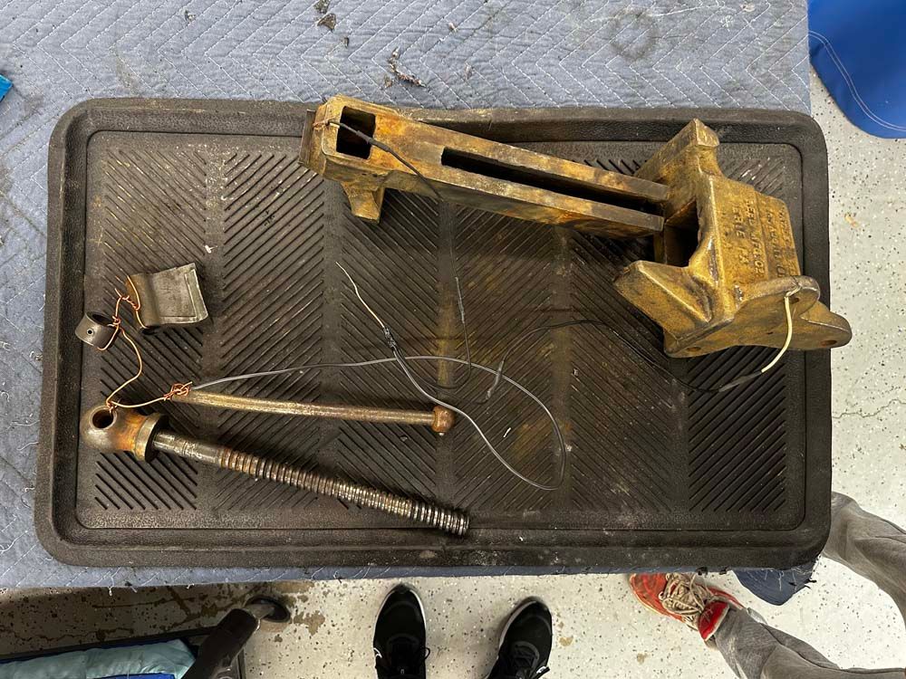 A piece of metal is sitting on top of a table.