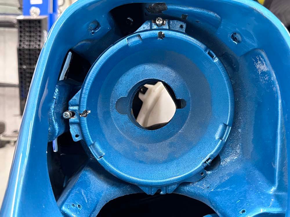 A close up of a blue object with a hole in it