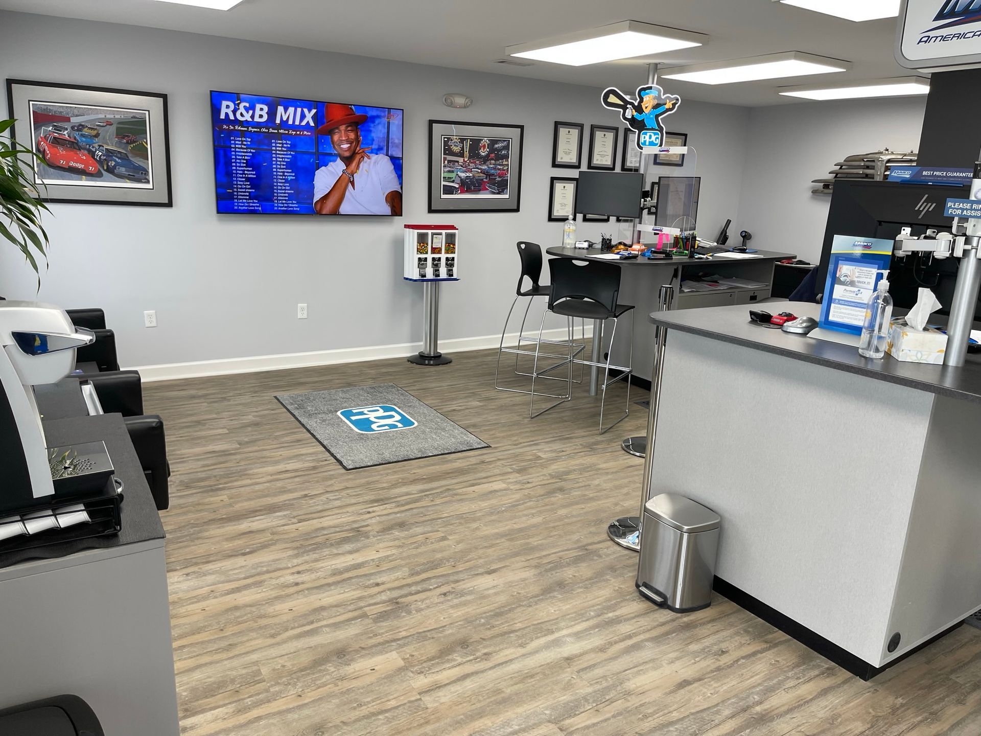 A living room with a large flat screen tv on the wall.