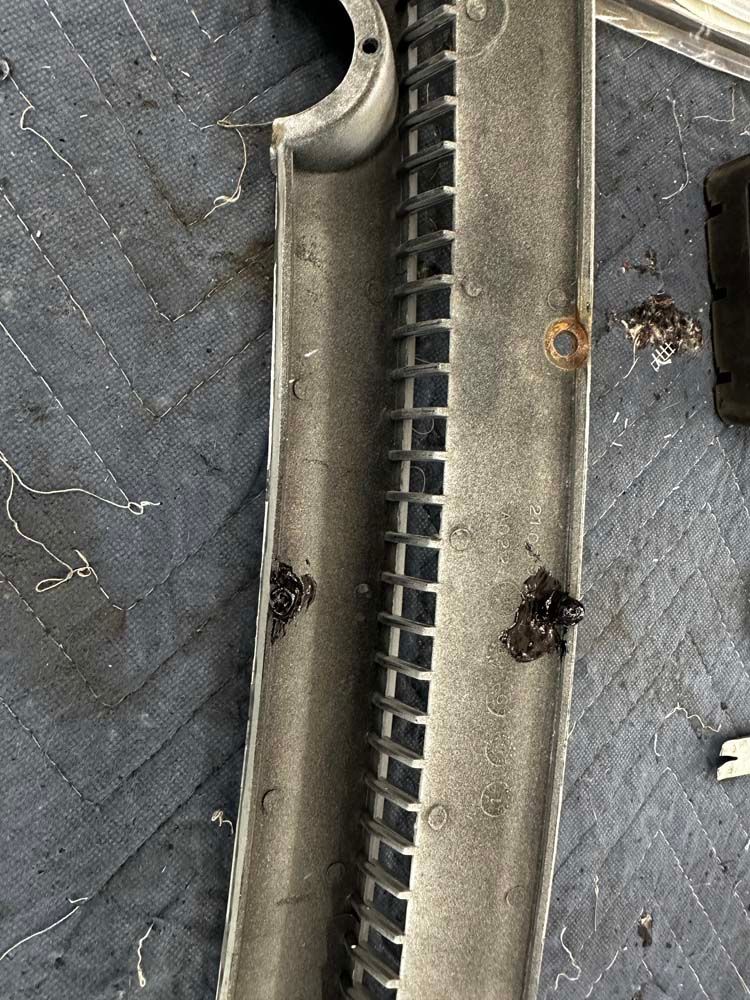 A close up of a piece of metal on a table.