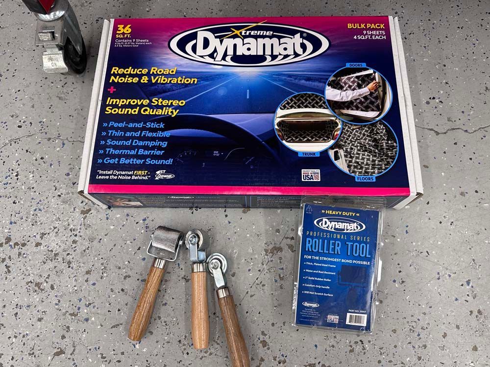 A box of dynamite is sitting on a concrete surface