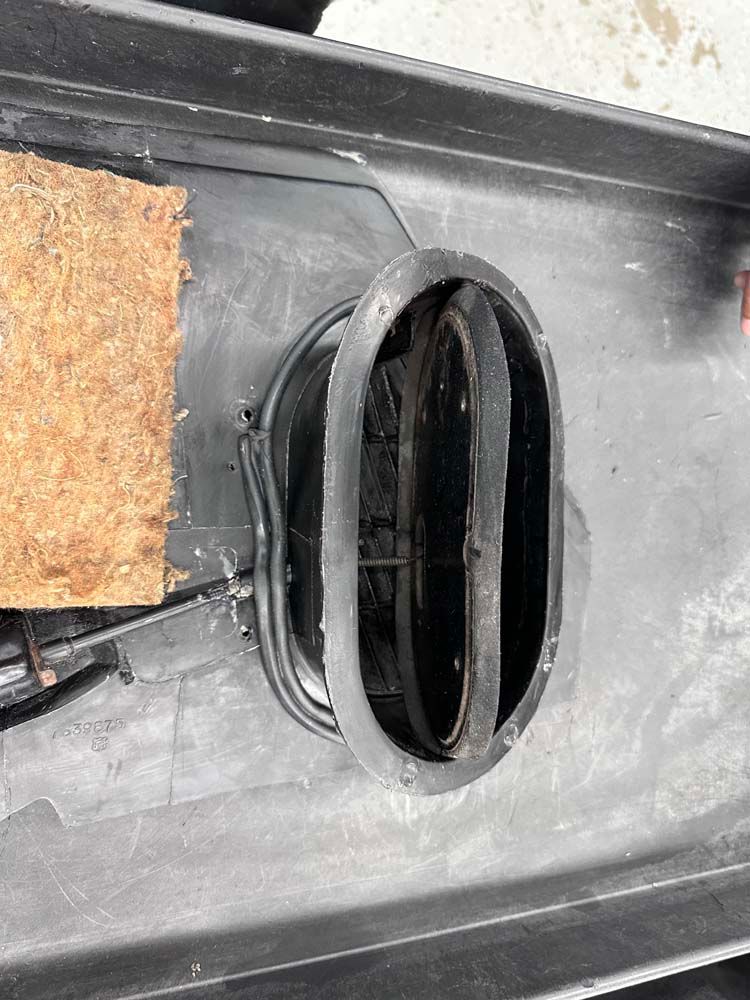 A close up of a black object with a hole in it.