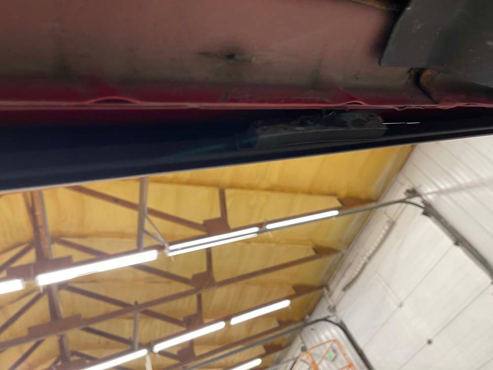 A ceiling with a lot of lights hanging from it