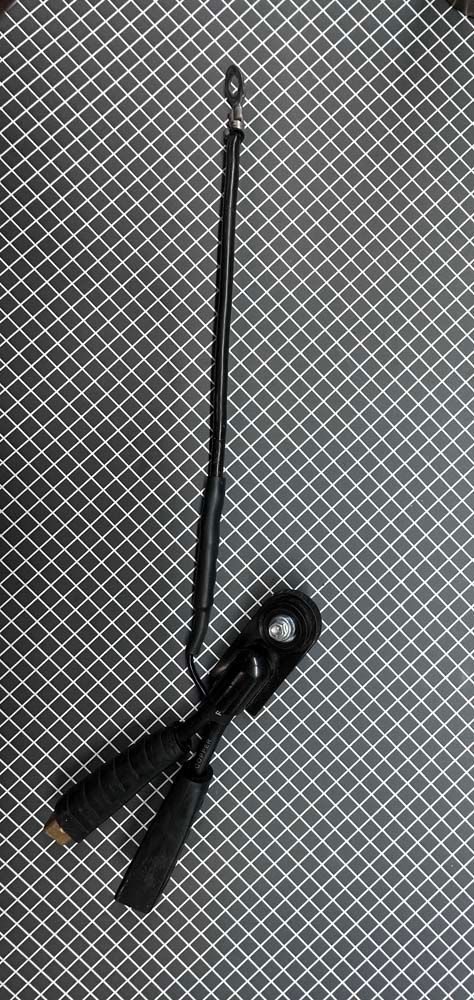 A close up of a pair of scissors on a table.