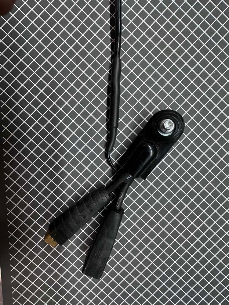 A close up of a pair of headphones sitting on top of a grid.