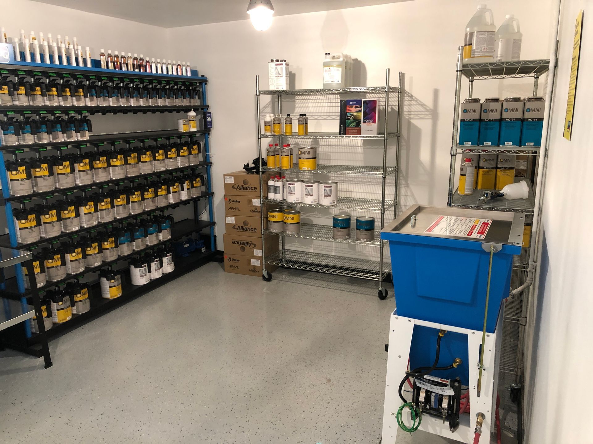 A room with a lot of shelves and bottles on them