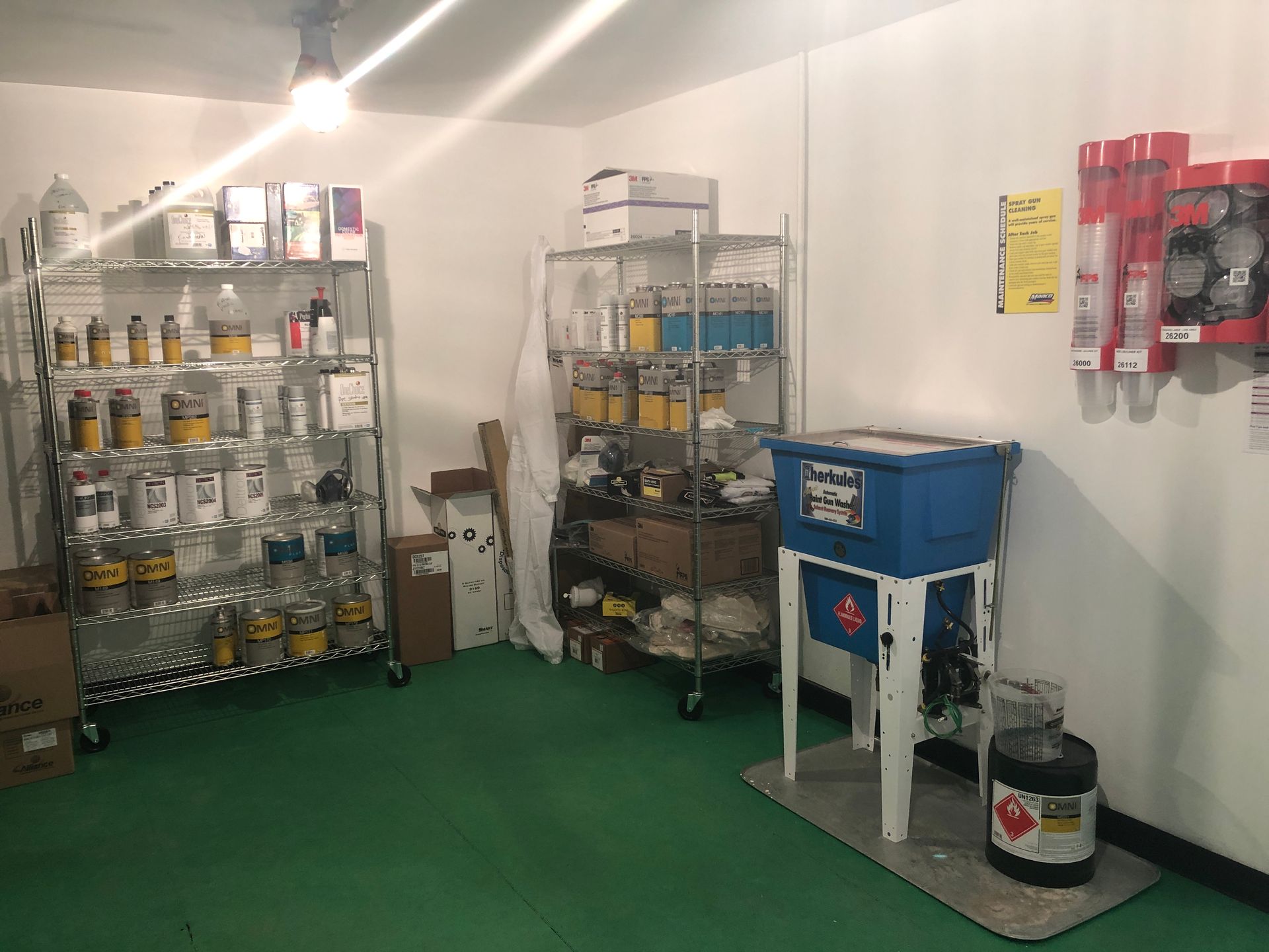 A room filled with lots of chemicals and a fire extinguisher.