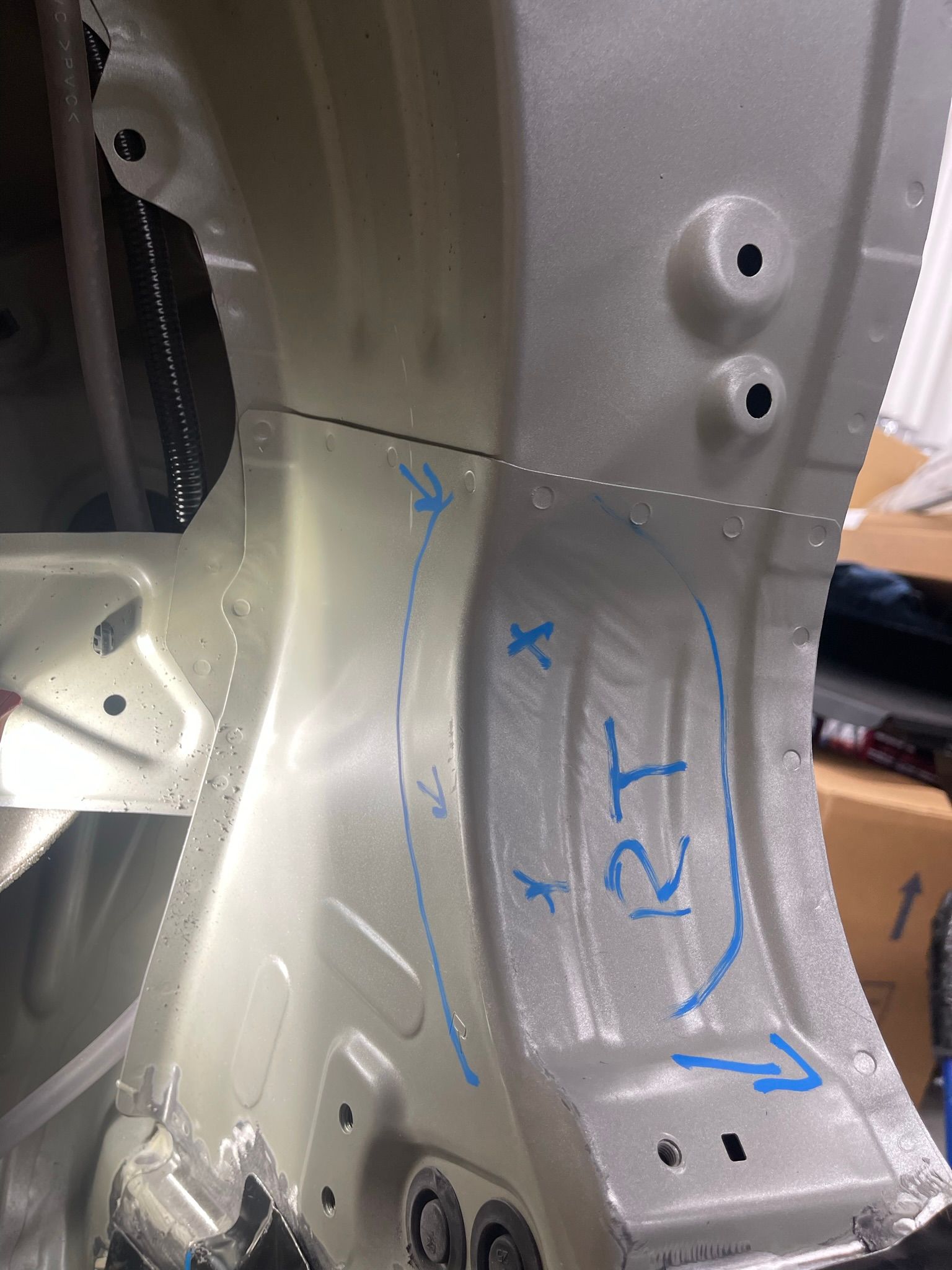 A close up of a piece of metal with the word rt written on it