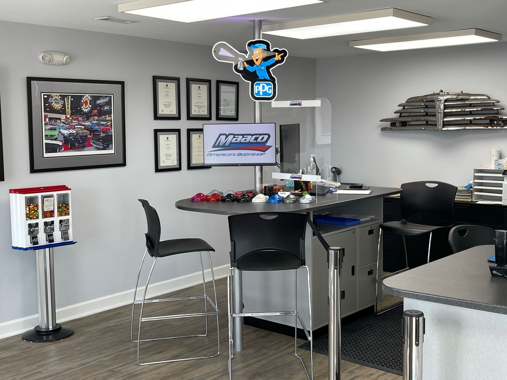 A room with a table , chairs , and a tv.