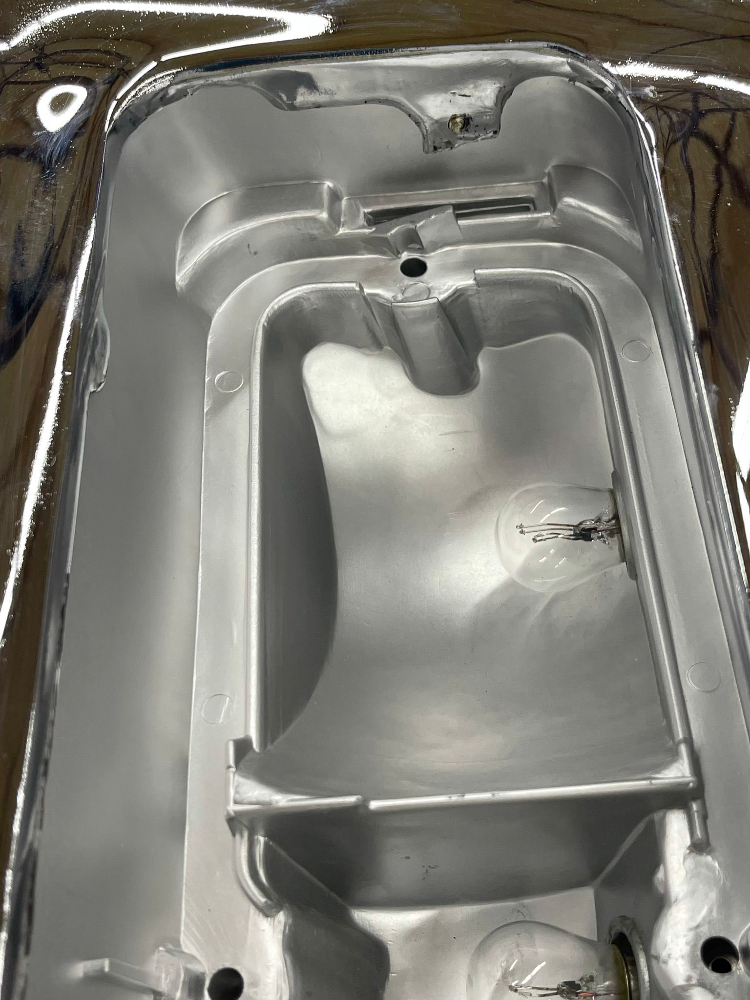 A close up of a metal container on a table.