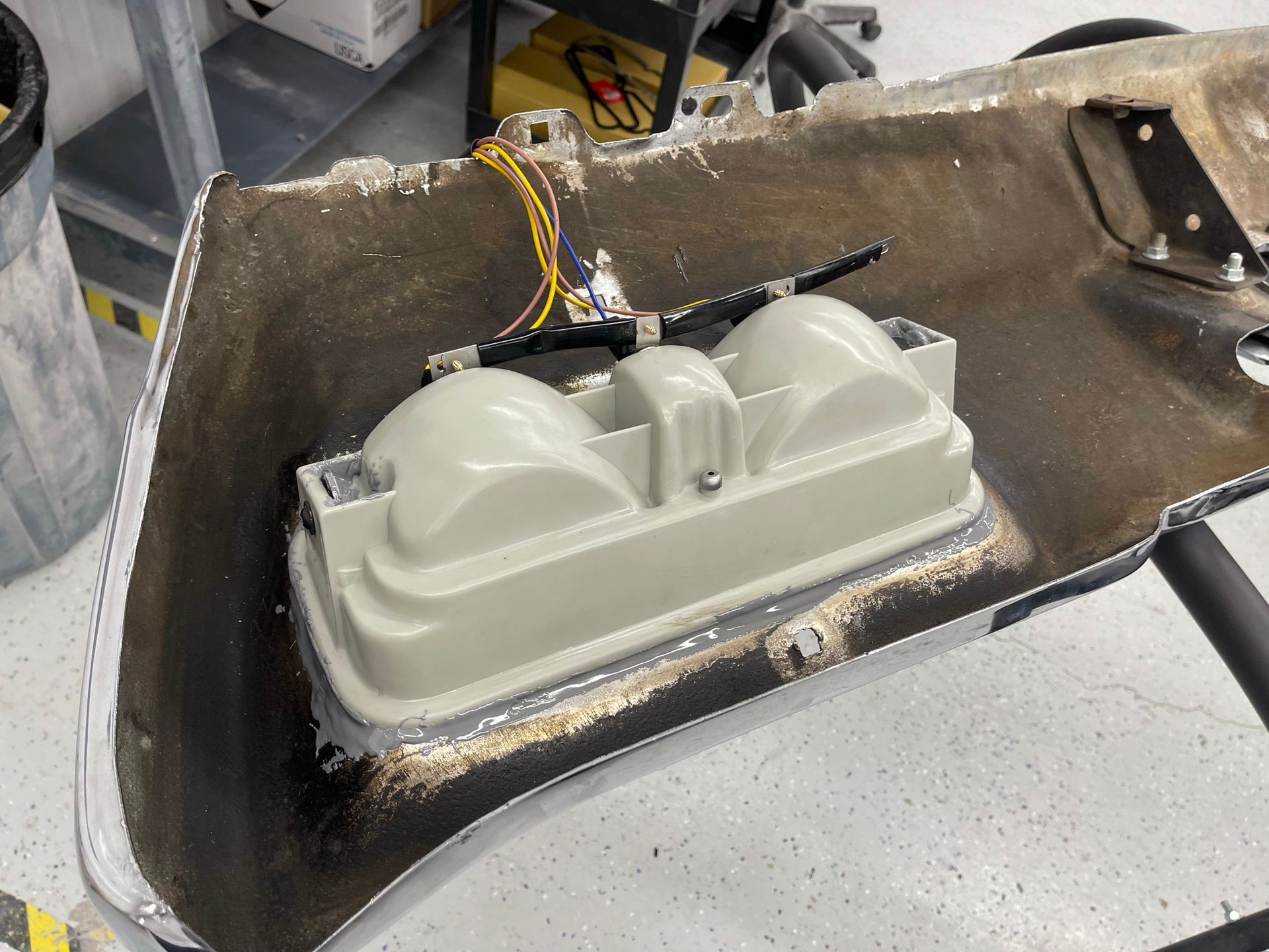 A car bumper with a light inside of it.