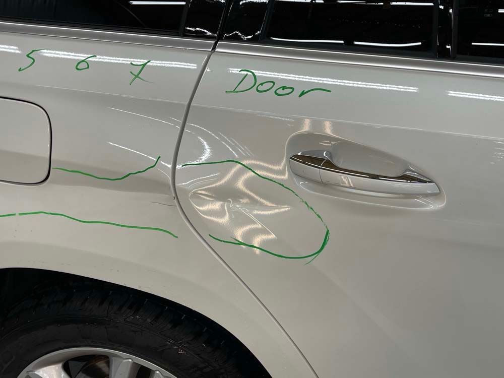 A white car with the word door written on it