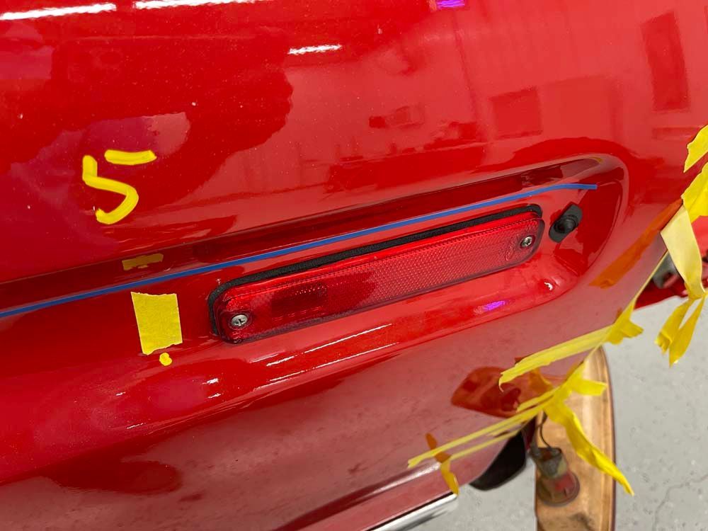 A red car with the number 5 on it