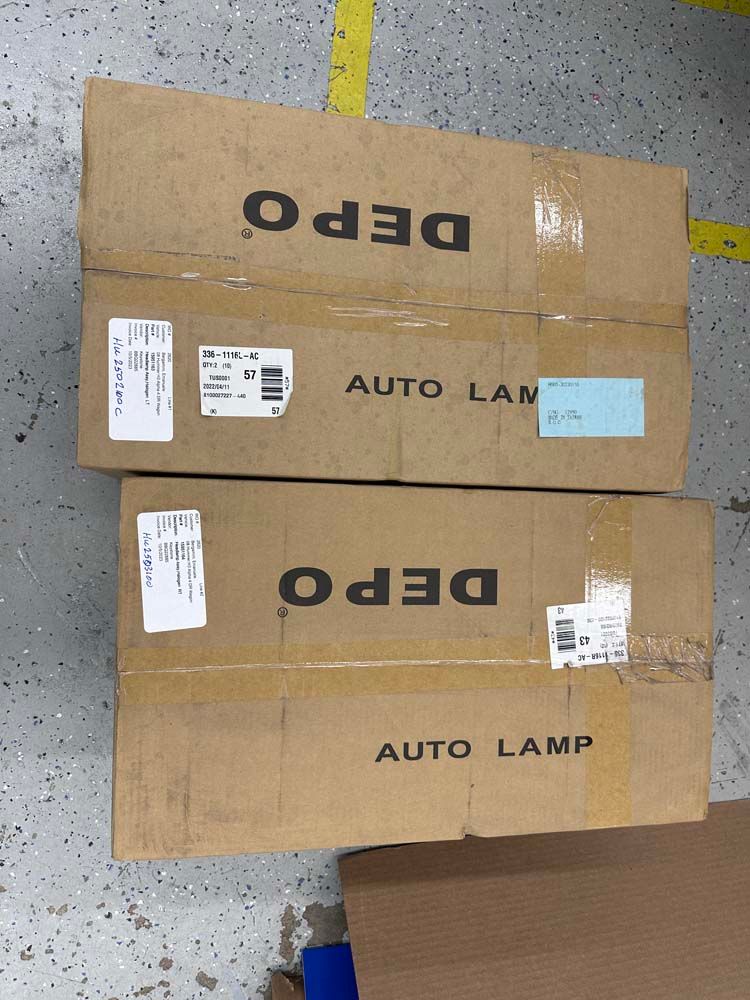 Two boxes of depo auto lamp are stacked on top of each other