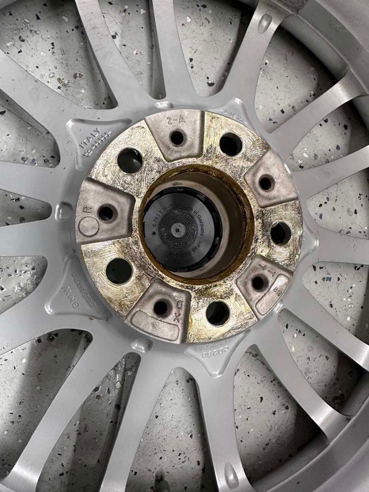 A close up of the inside of a car wheel.