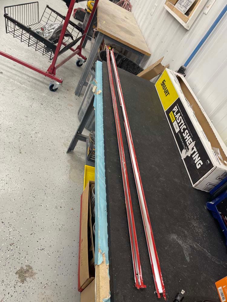 A box of plastic sheeting is sitting on a table.