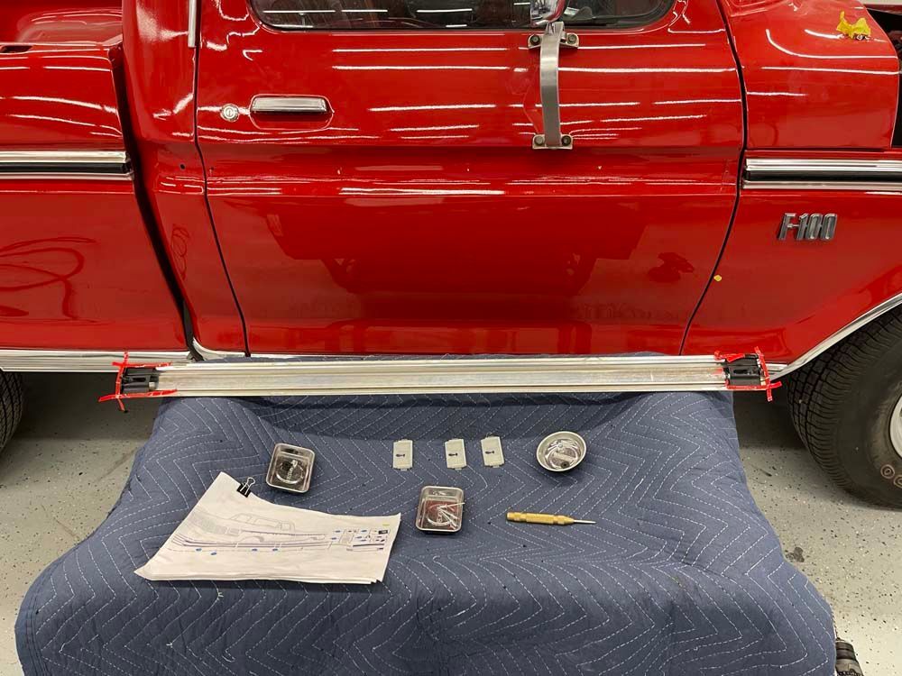 A red truck with the word f100 on the side