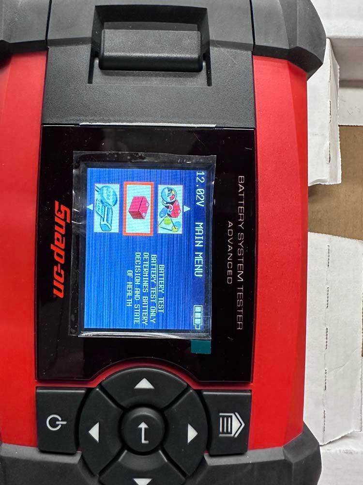A snap-on device displays a blue screen