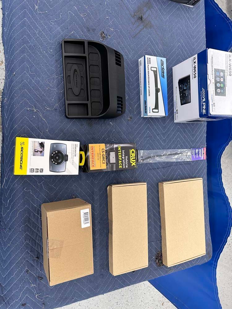 A bunch of boxes sitting on top of a blue table