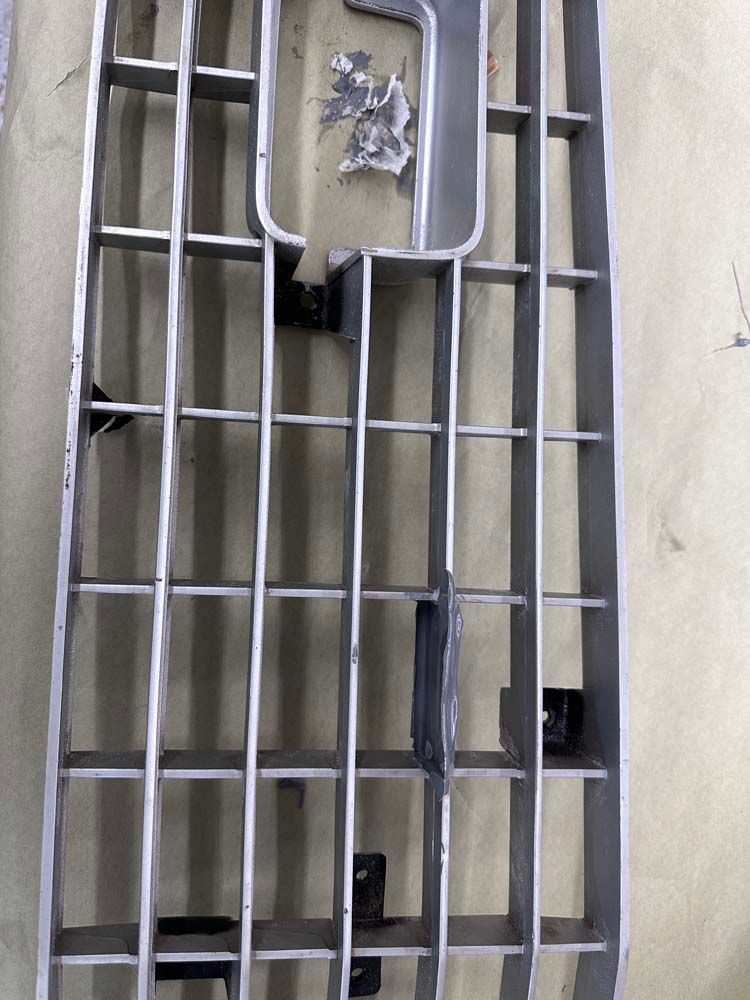 A metal grille is sitting on top of a table.