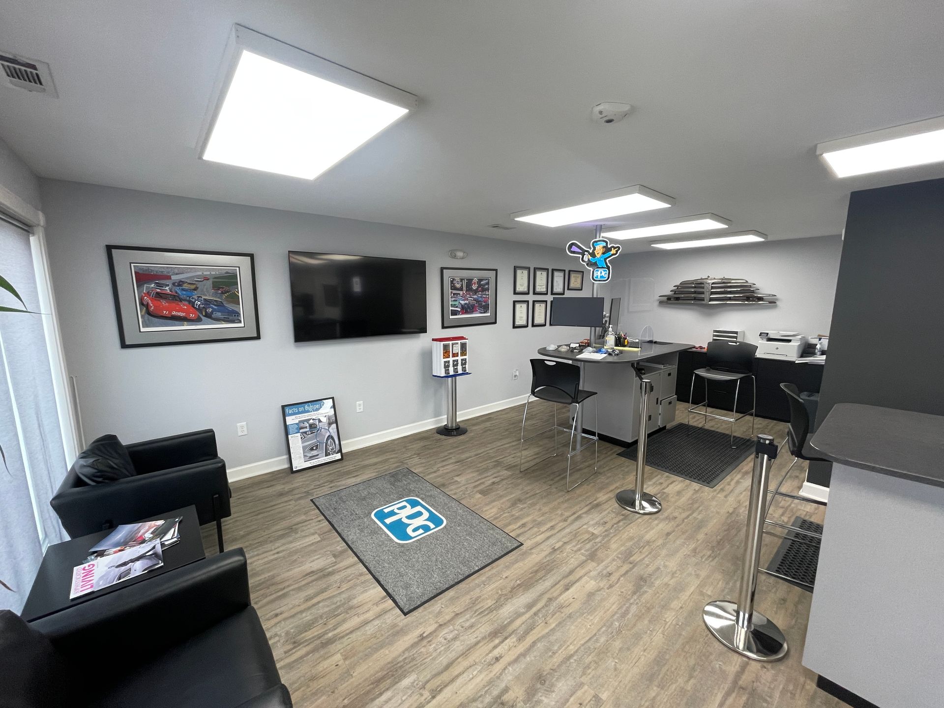 A living room filled with furniture and a flat screen tv.