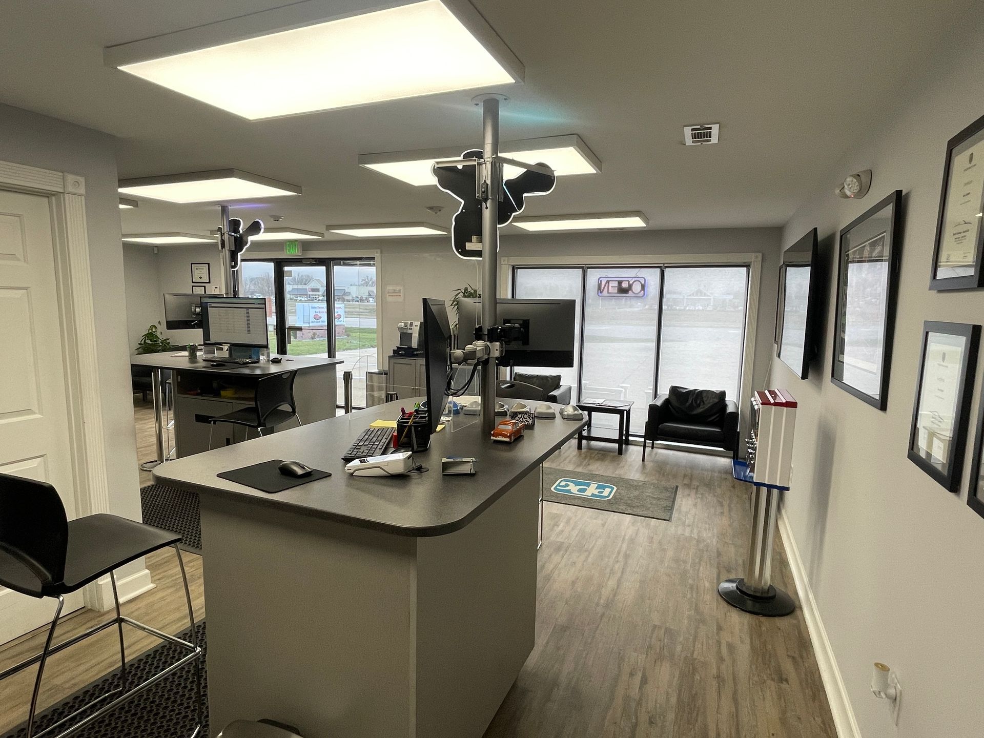 A large room with a large island in the middle of it.