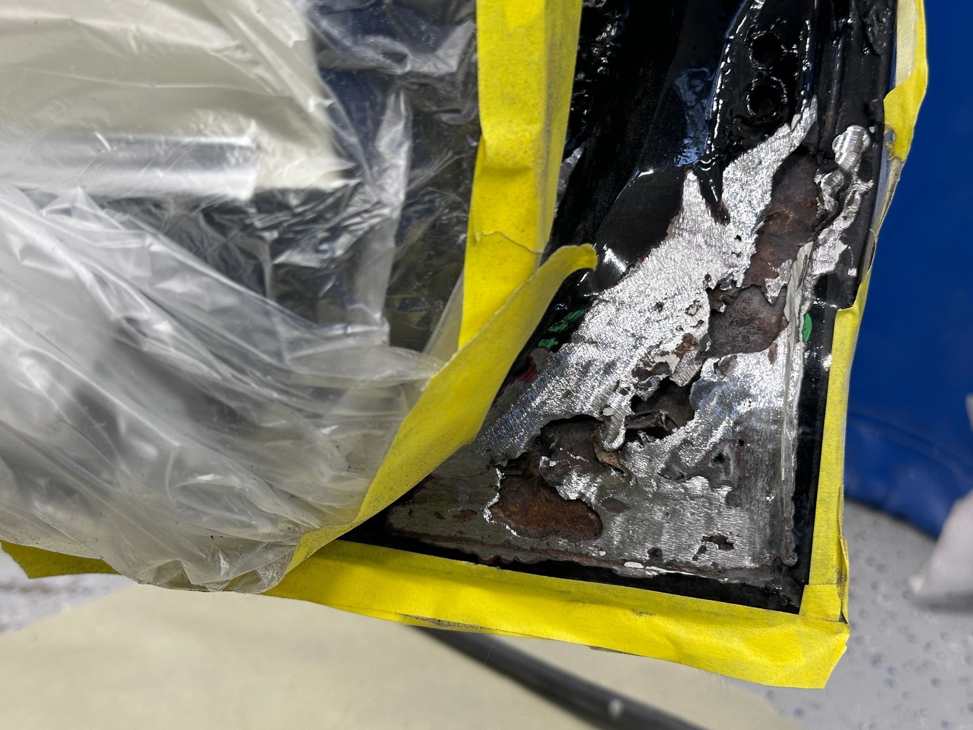 A plastic bag with a yellow border is sitting on a table.