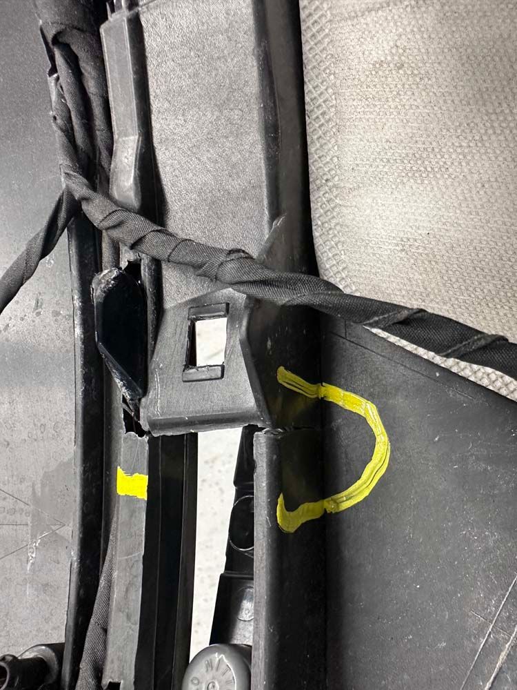 A close up of a piece of plastic with a yellow circle on it.