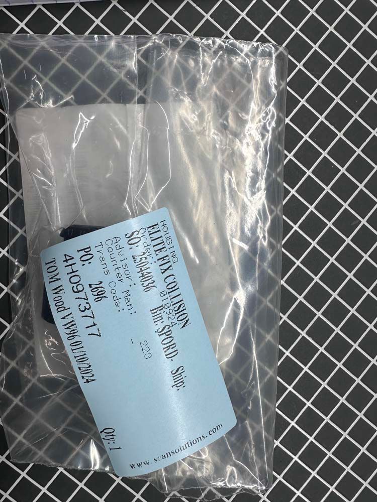 A plastic bag with a blue label on it