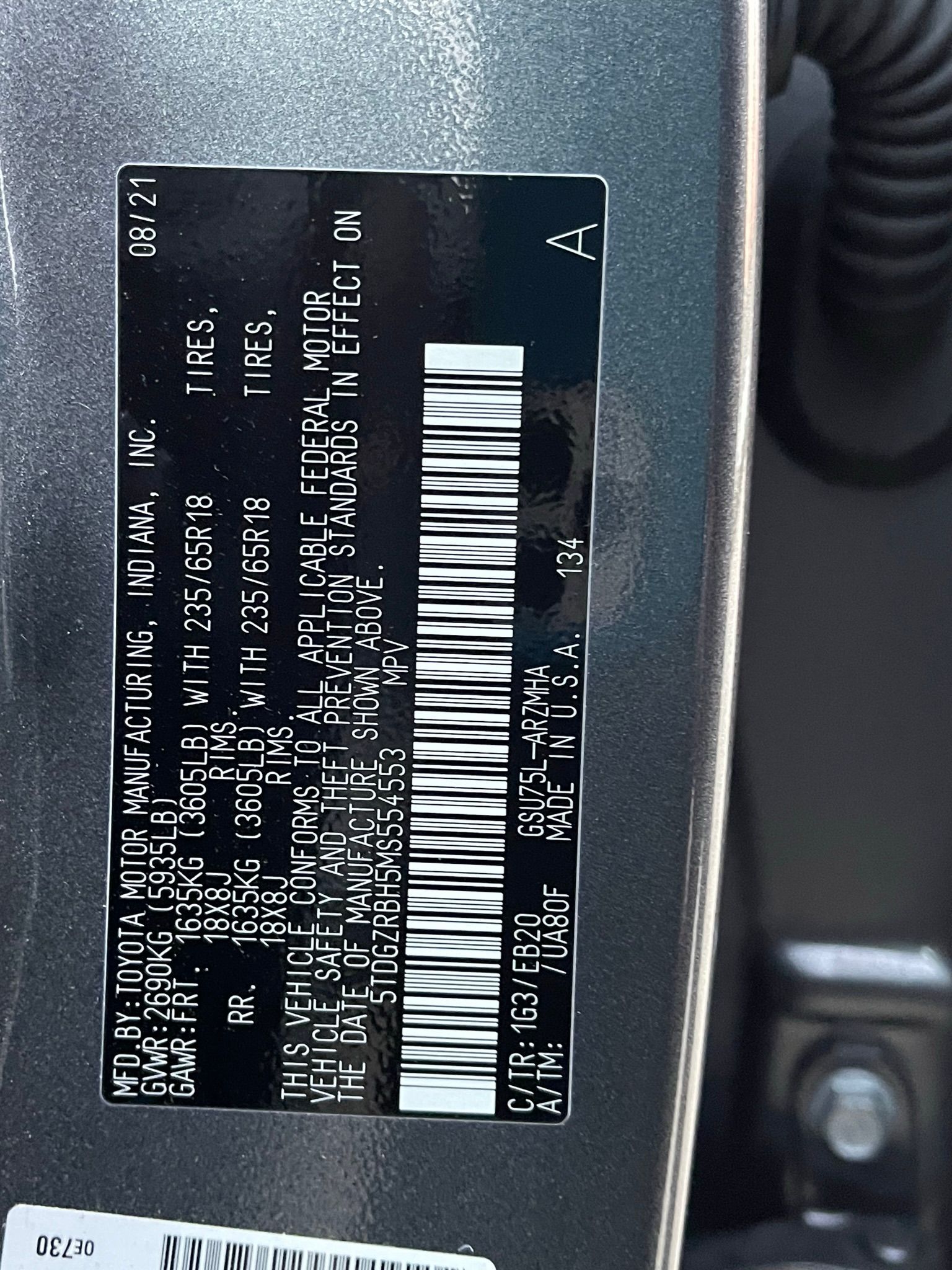 A close up of a car 's identification plate