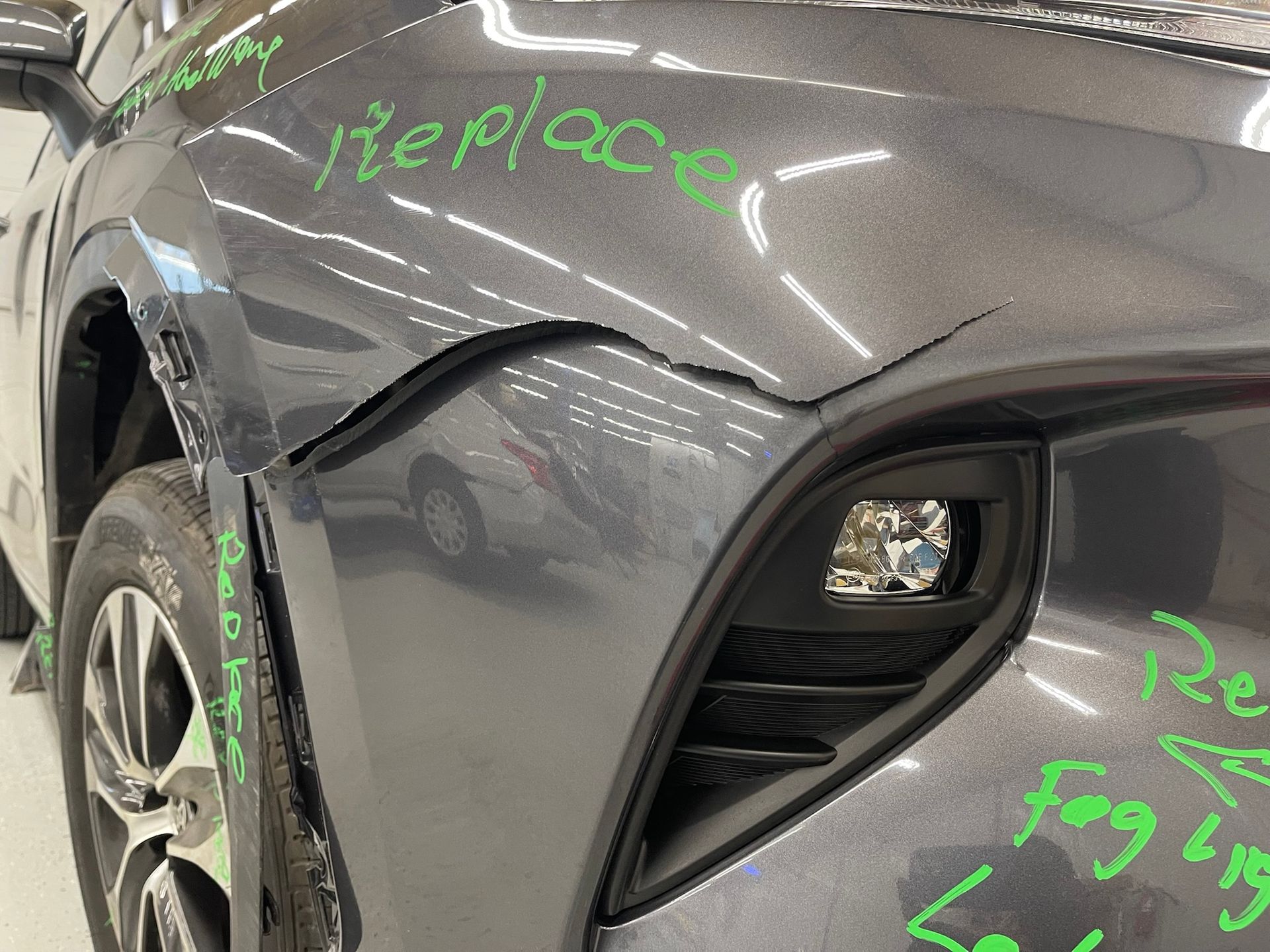 A close up of a car with the word replaced written on it