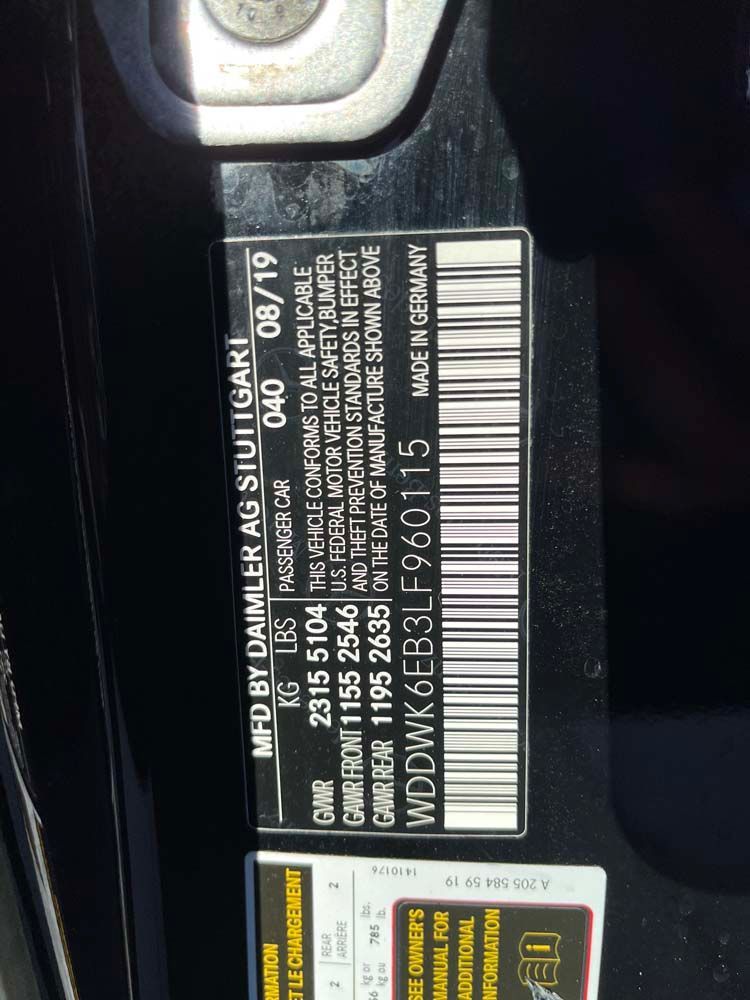 A black car with a barcode on the side of it.