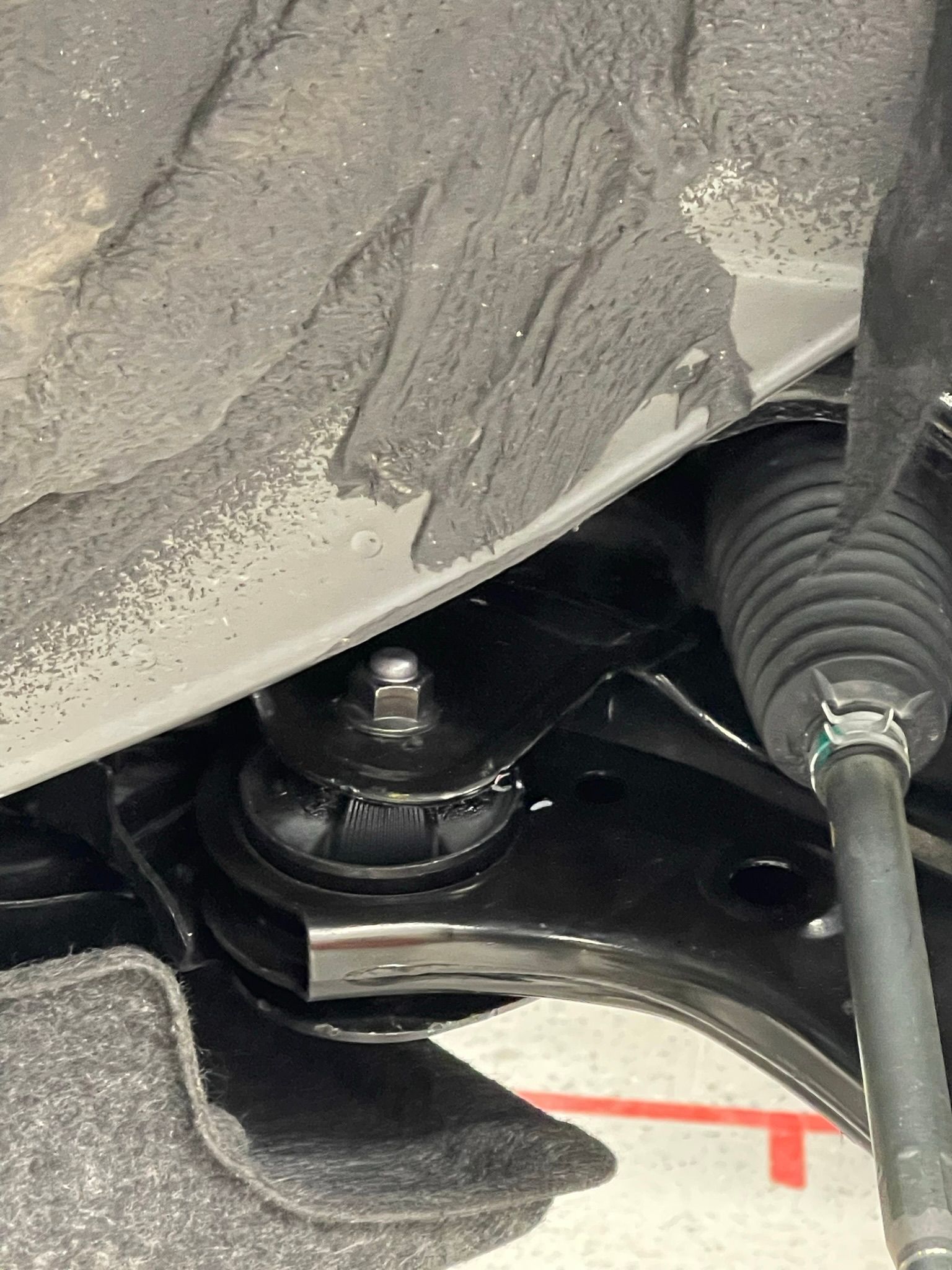 A close up of the underside of a car.