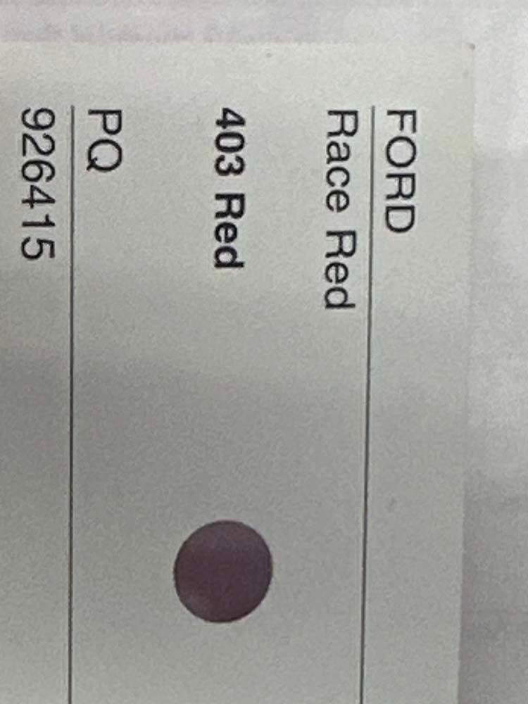 A piece of paper that says ford race red on it