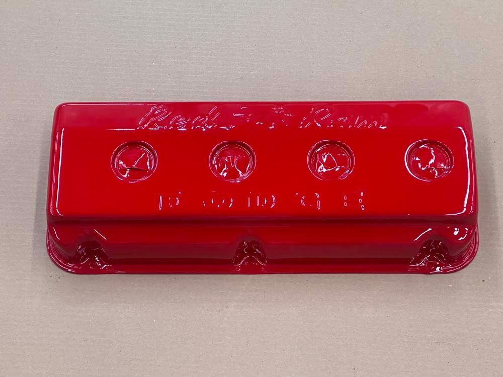 A red container with the word racing on it