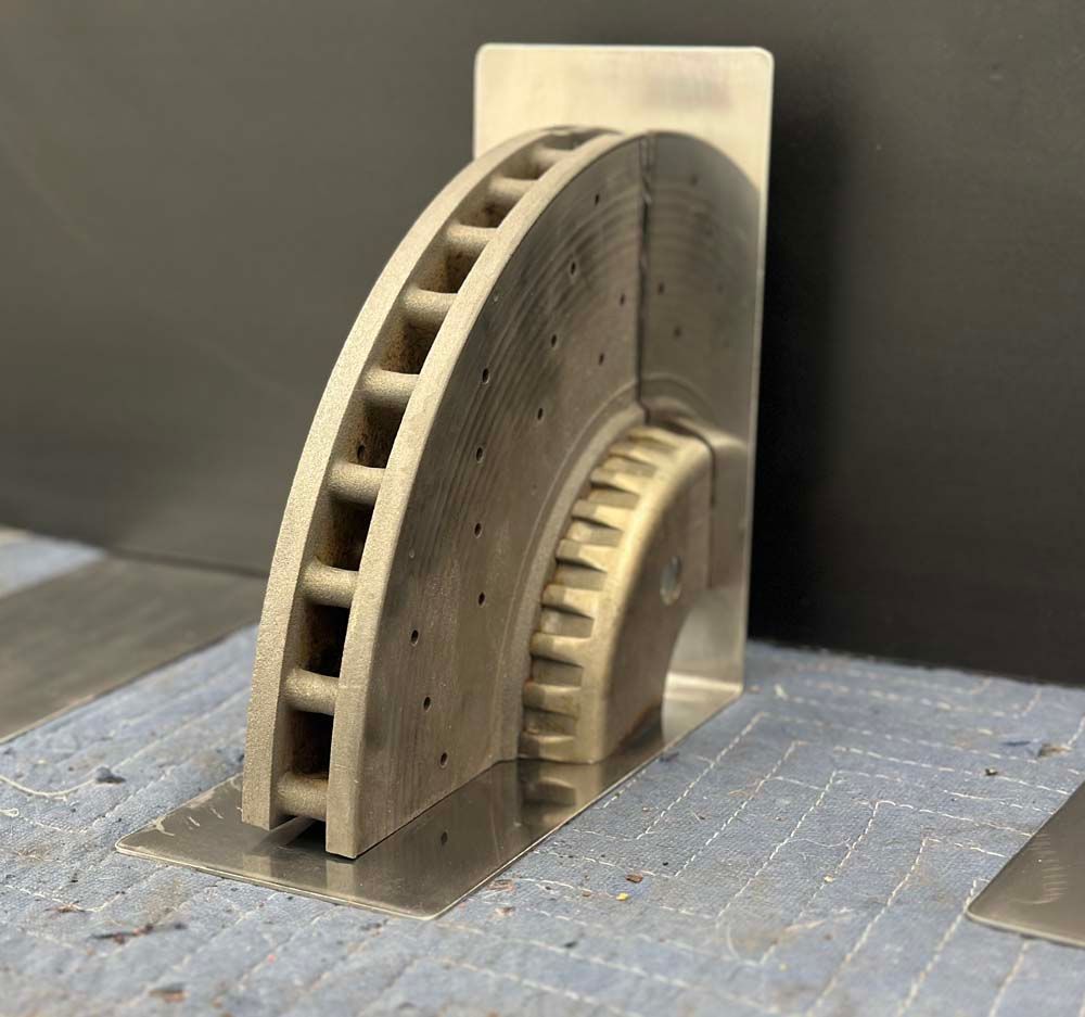 A piece of metal that looks like a brake disc