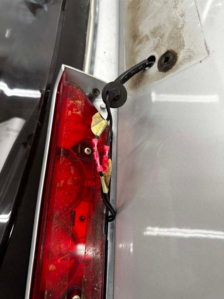 A close up of a rear light on a car.