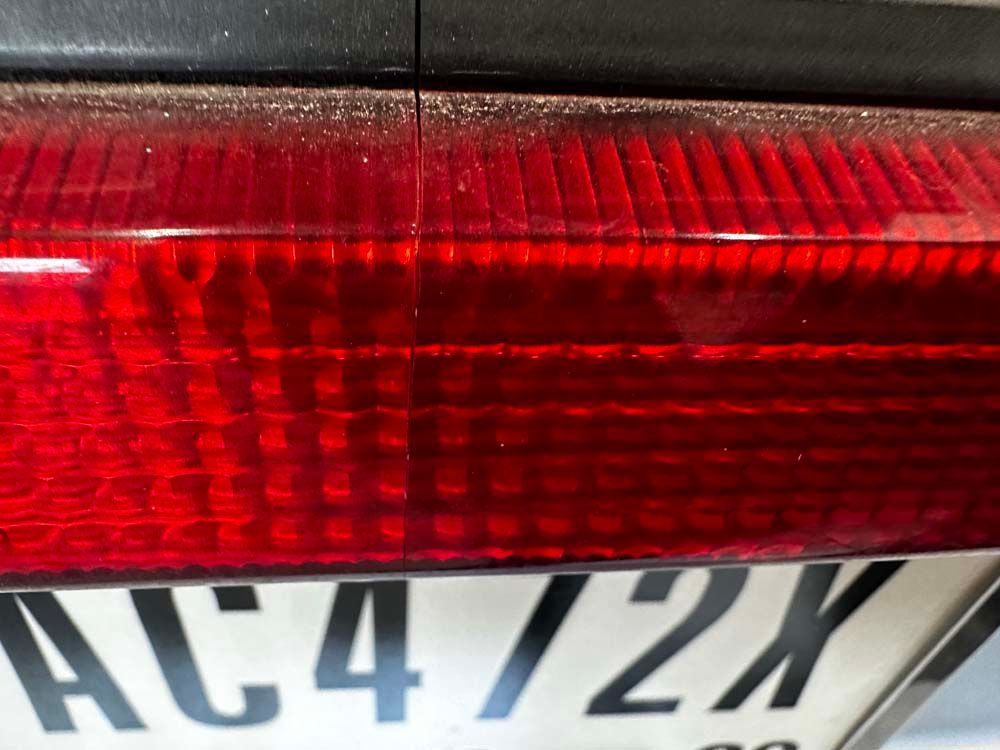 A close up of a license plate that says ac4 12x